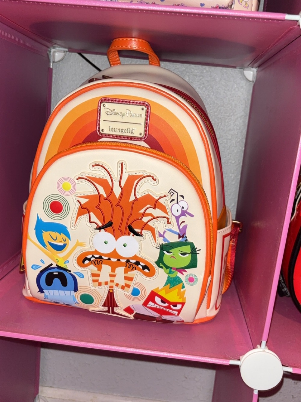 Loungefly Cream Mini Backpack with Orange Rainbow & Inside Out 2 Faces